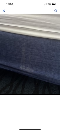 Nasty white crap on the box spring cover