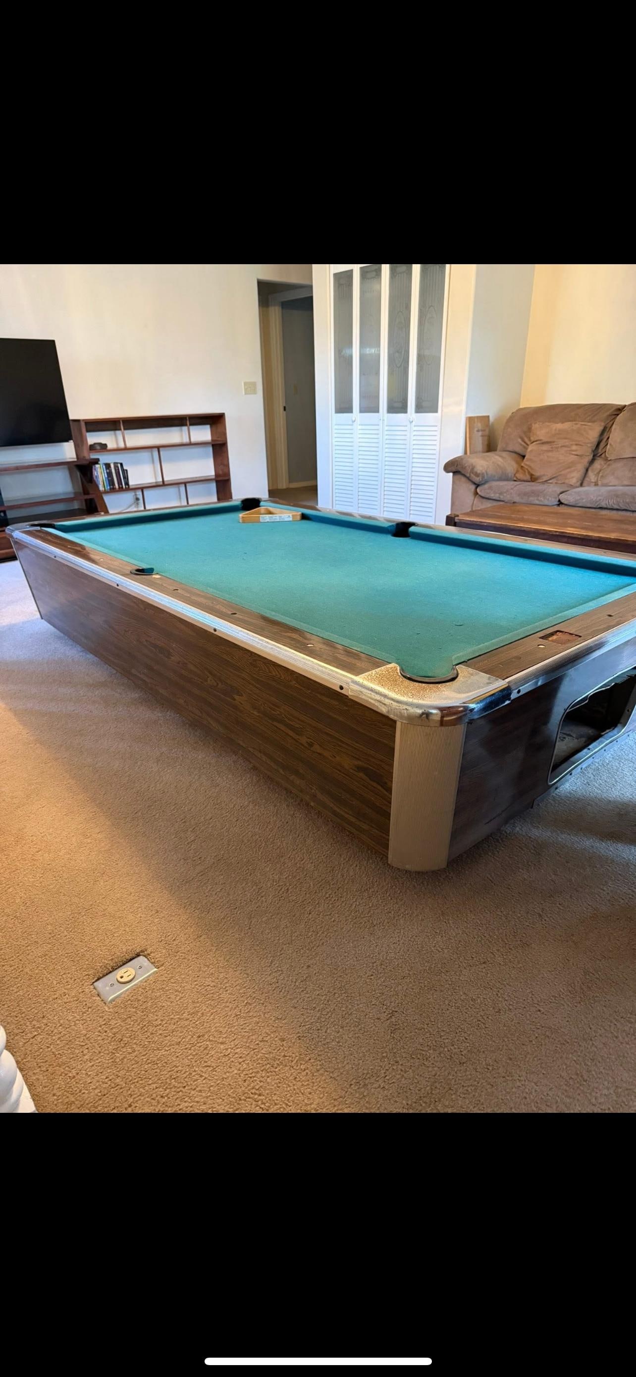 Pool table on the floor