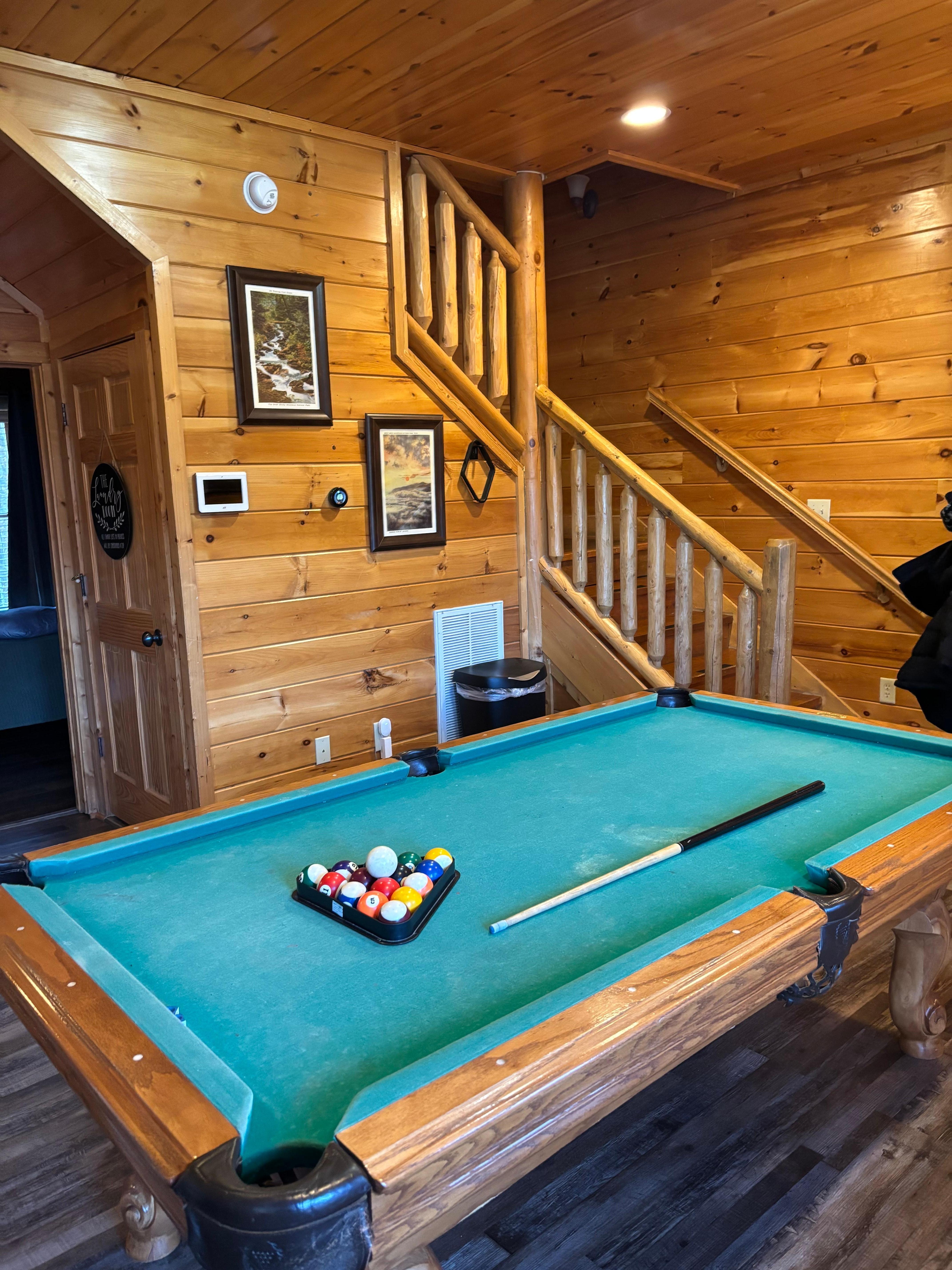 Pool table and other games in the game room.