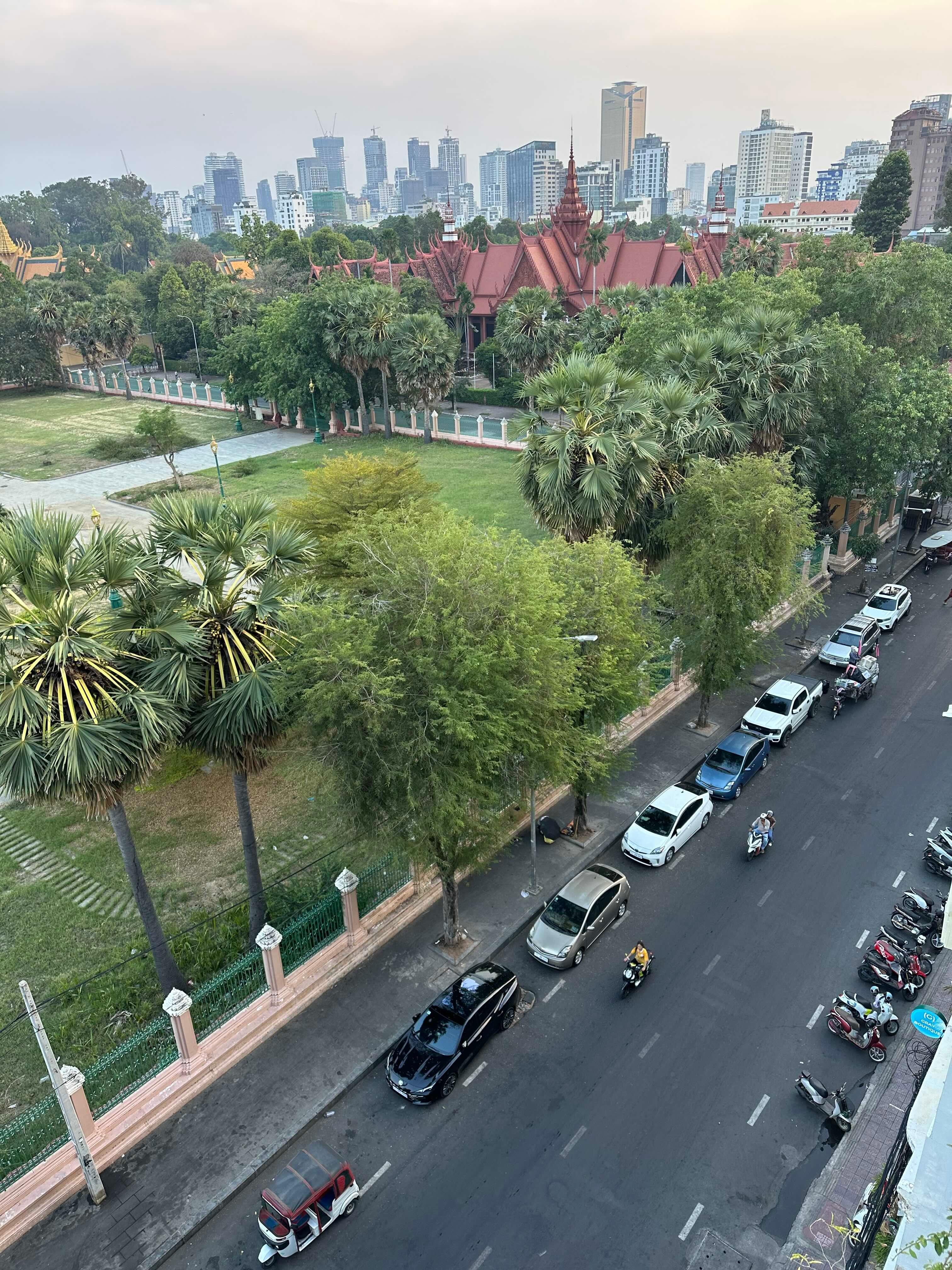 View to the right, with bustling Street 178, the National Museum, and the modern city in the distance.