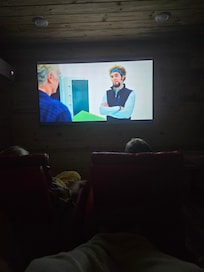 Love love LOVE the movie theater but would recommend pillows under feet for more comfort :)