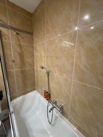Room I got. Not even a place to hang the shower head