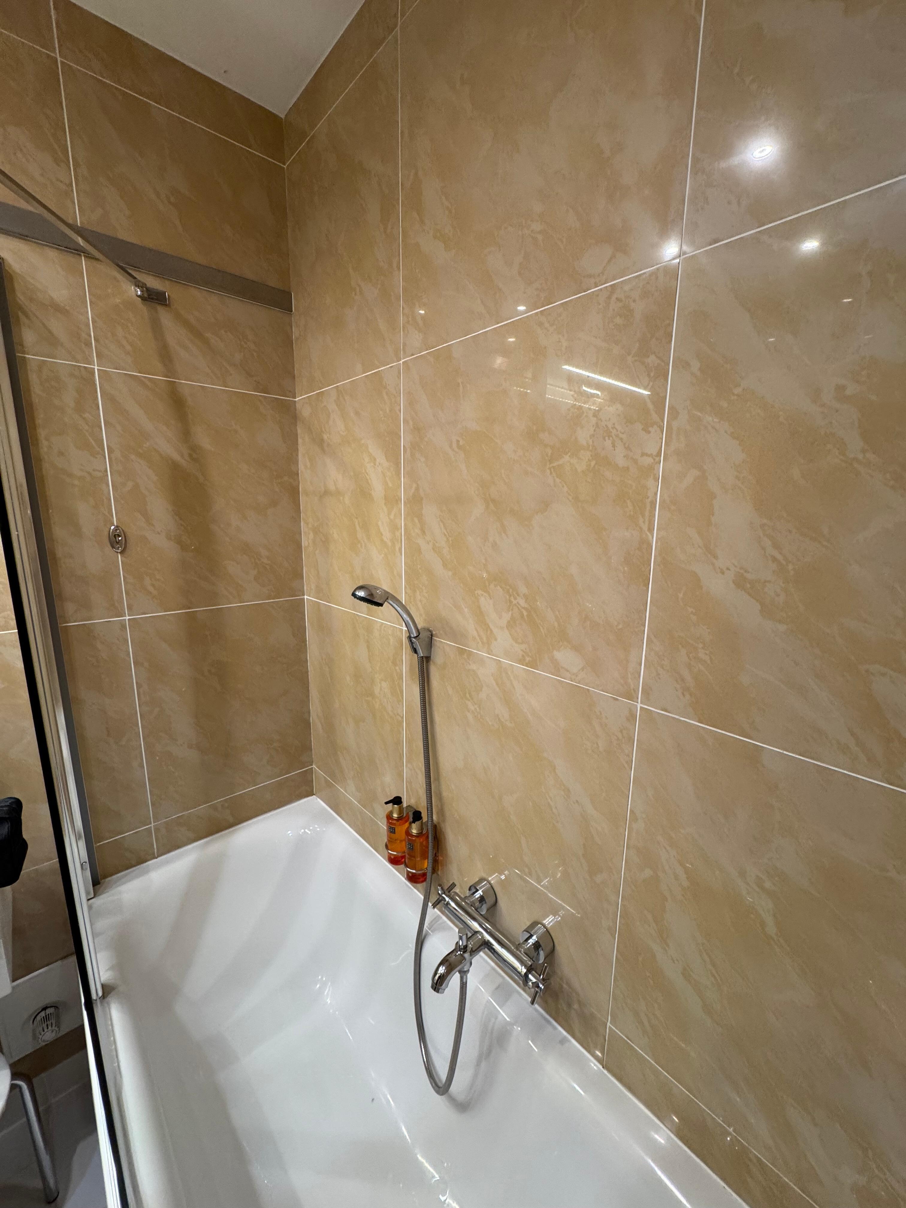Room I got. Not even a place to hang the shower head