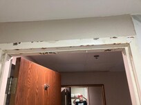 Bathroom door frame, rusty and paint pealing