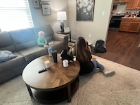 Living room was spacious for kids to play and a nice tv to watch football. Couch and chair were comfortable.