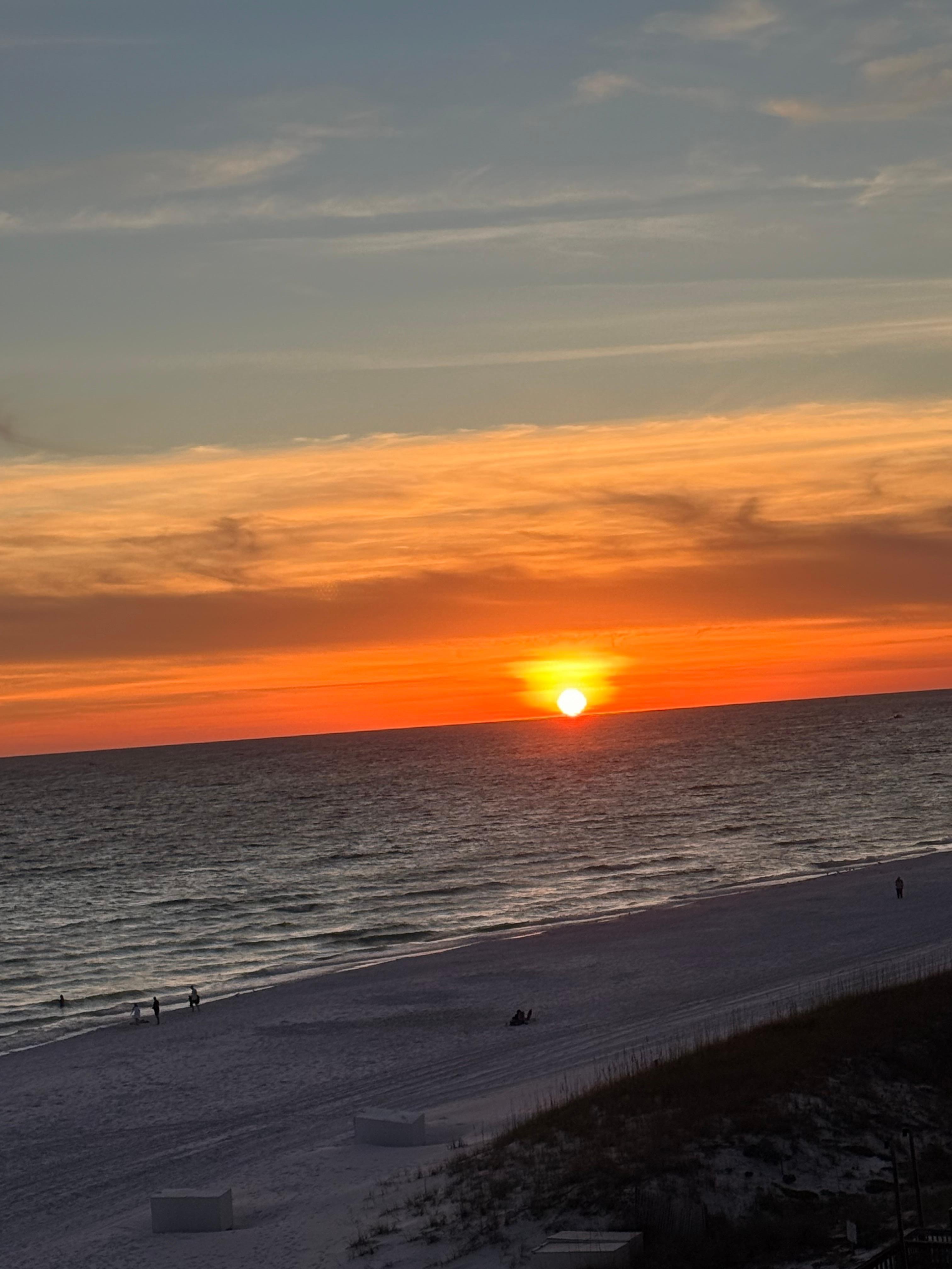 An evening ritual- “wine down” with the sun. Sunsets are spectacular from the balcony.  