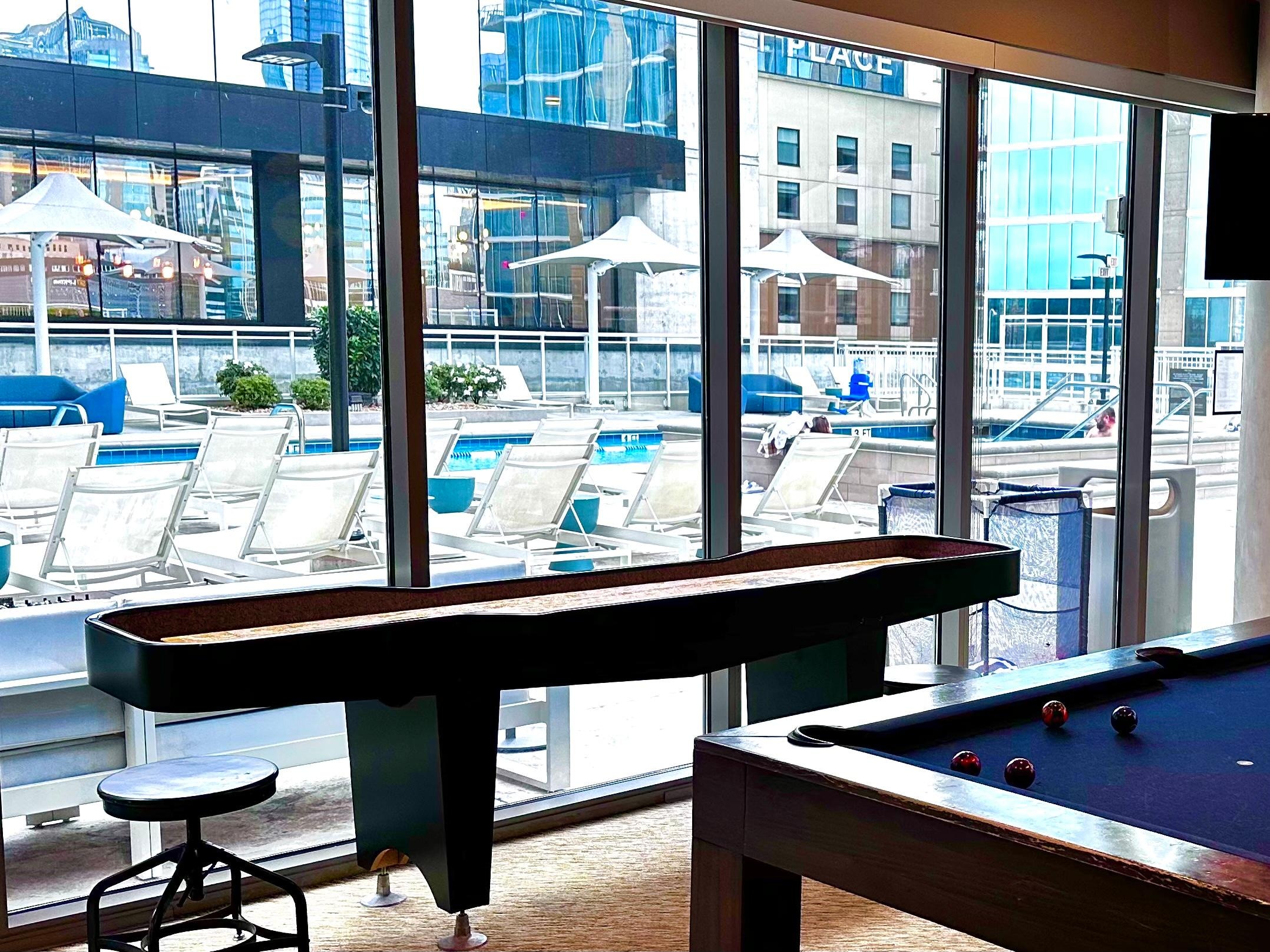 Game room looking at pool