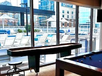 Game room looking at pool