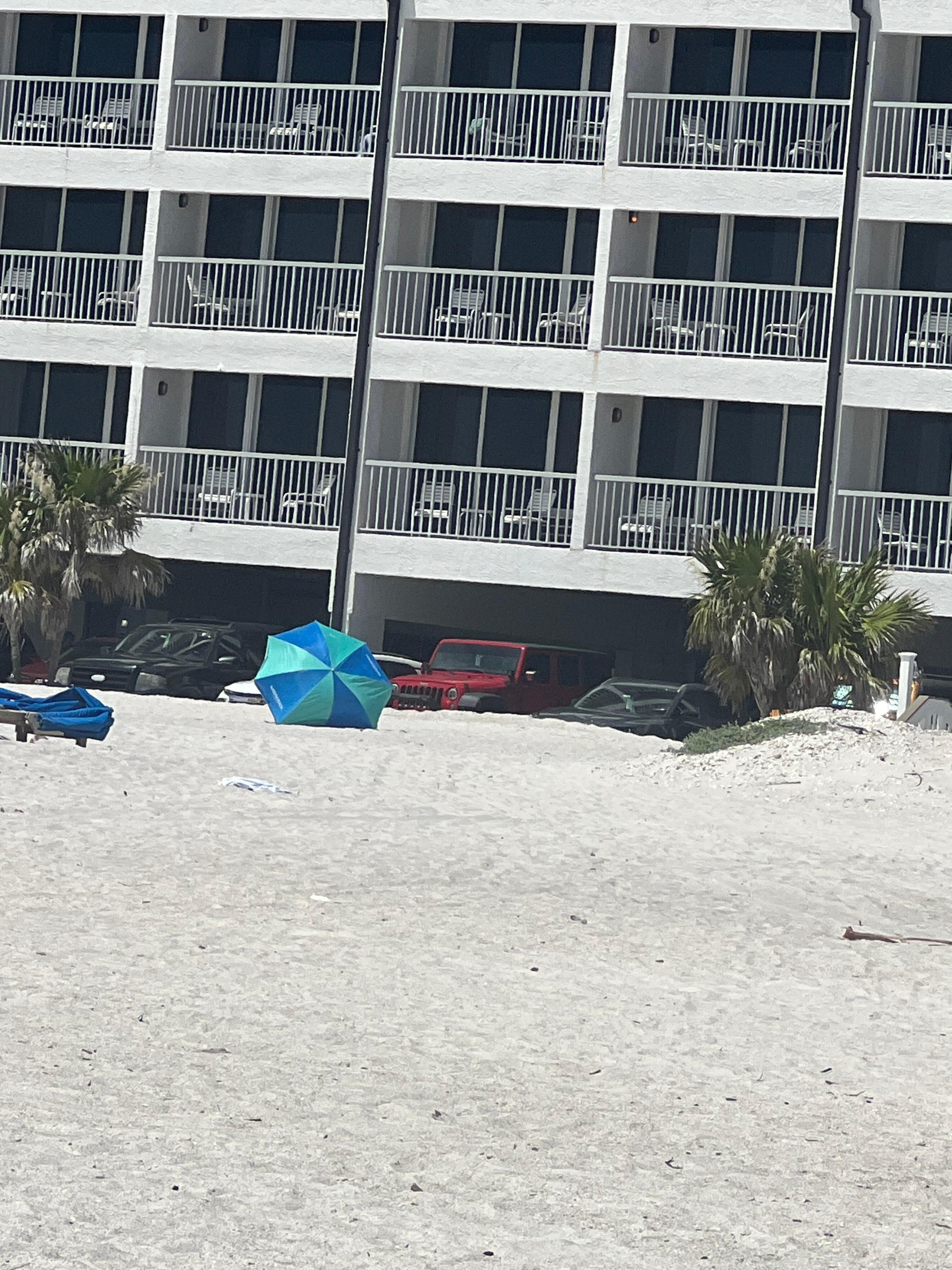 Ocean front balcony’s and shows some of the parking