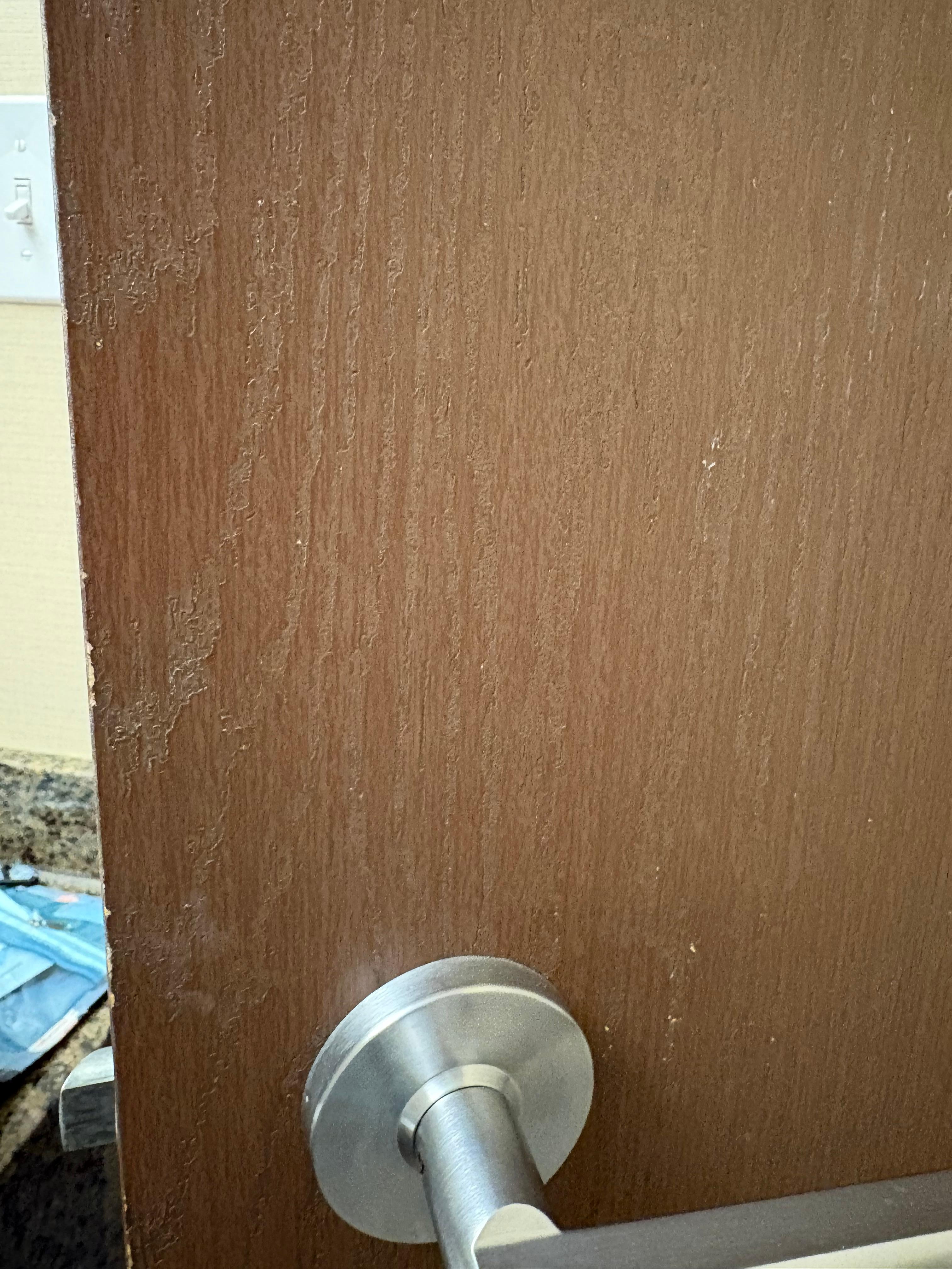 Door has white stuff on it 
