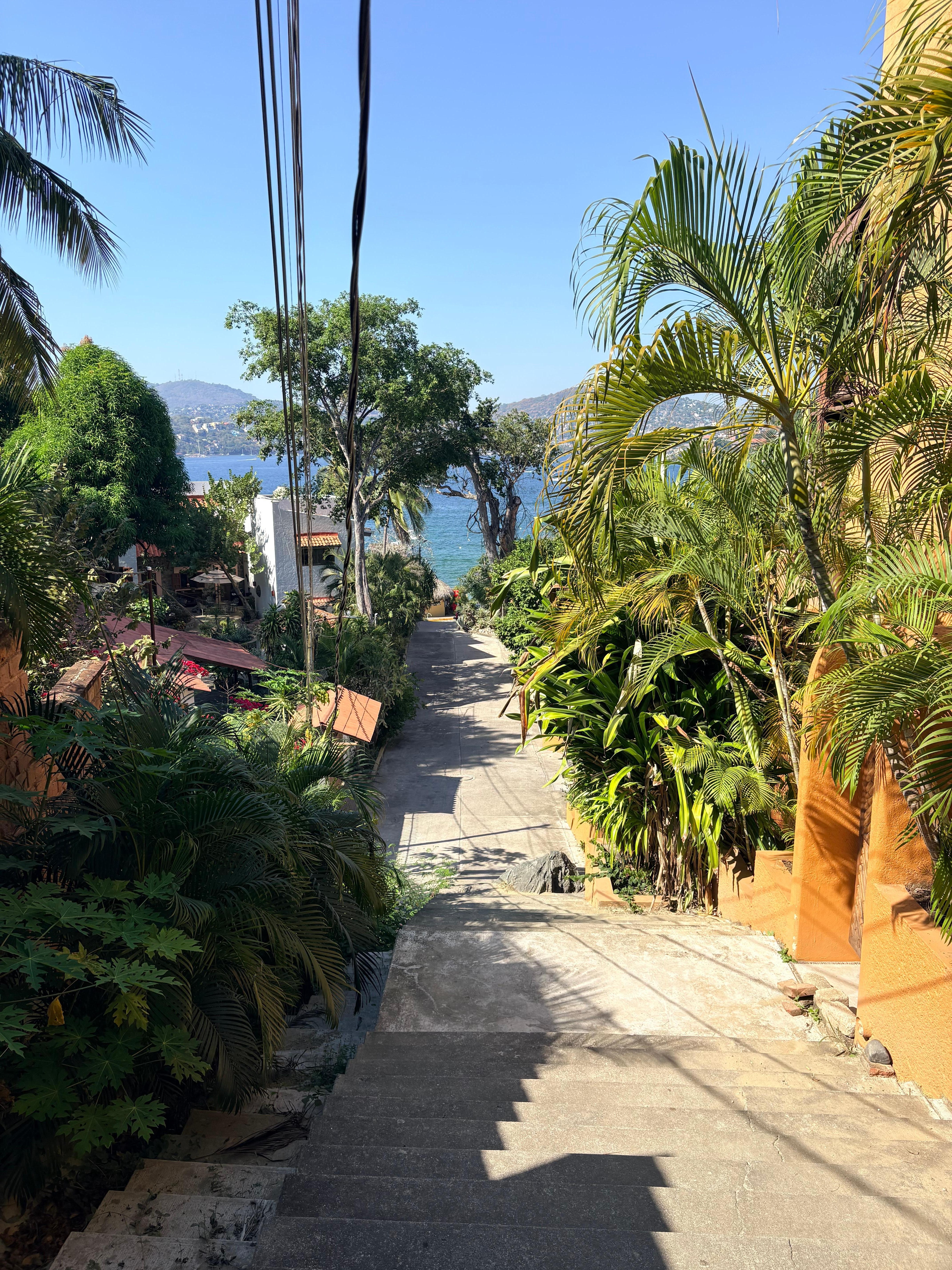 Walk down to the beach. It’s steep but there are some stairs. 