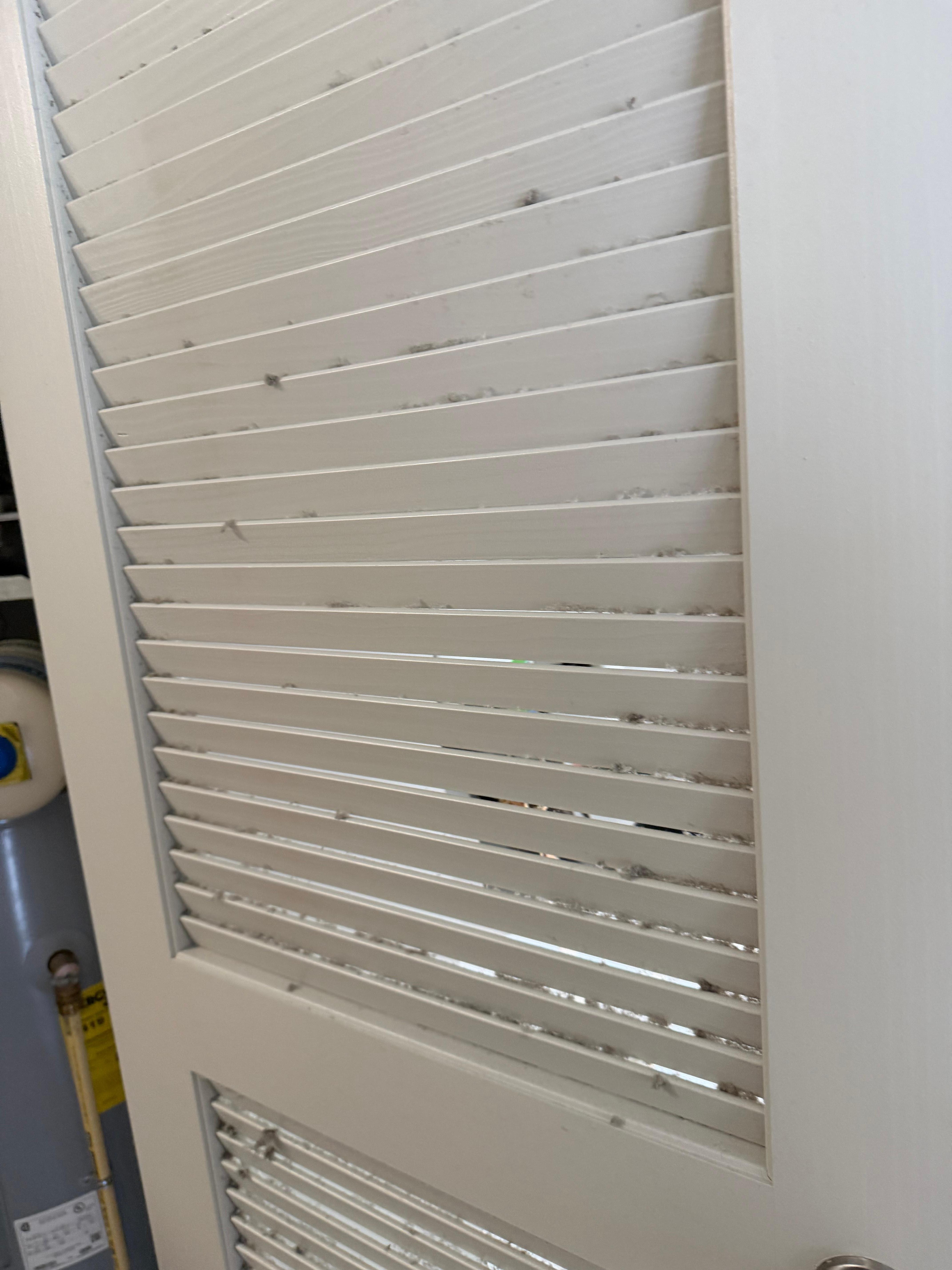 Dust on door from heating vent in closet 
