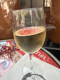 Wine sitting at a street cafe