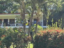 Rooms look at beautiful tropical gardens