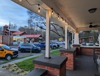 View from porch to post office and Damascus Old Mill