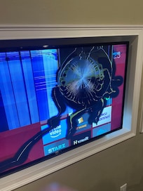 Broken tv in game room. None of the advertised video games worked.