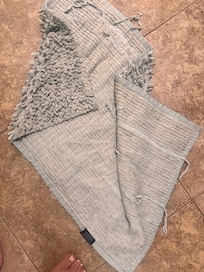 Dirty bath mat at checkin