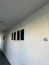 Window and light that shines in all night to the “queen” bedroom.