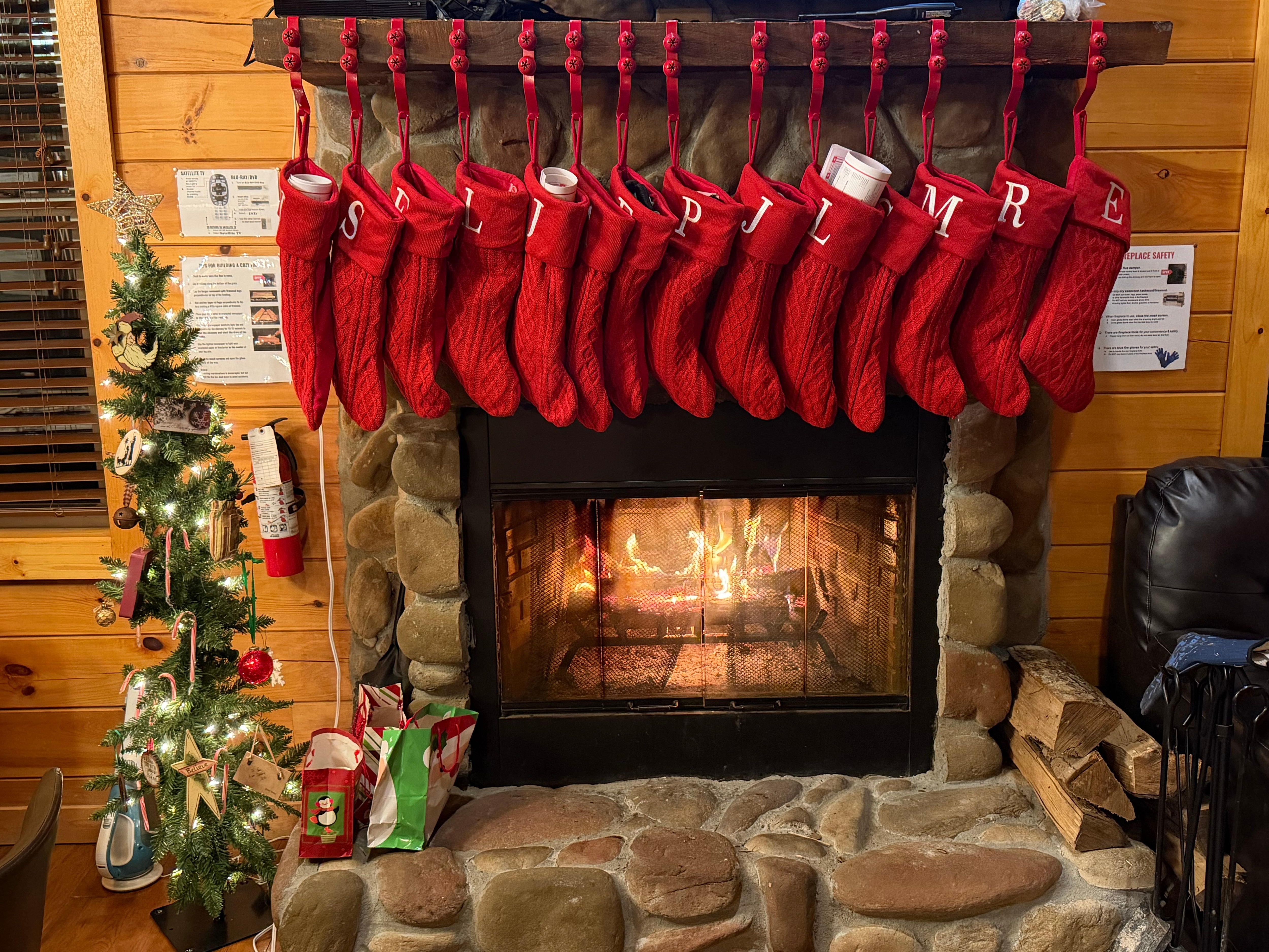 The stockings were hung by the Chimney with care!
We were told by the hosts that we could bring our own decorations so a couple of additions to make it look festive 
