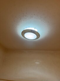 Light fixtures falling in shower