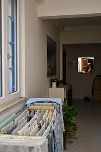 stinky laundry drying in the entryway