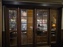 The French doors out to the balcony, overlooking the swamp inside Bass Pro