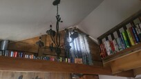 Loft alcove with chandelier