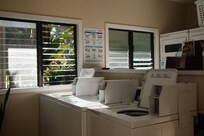 Laundry room directly below the condo