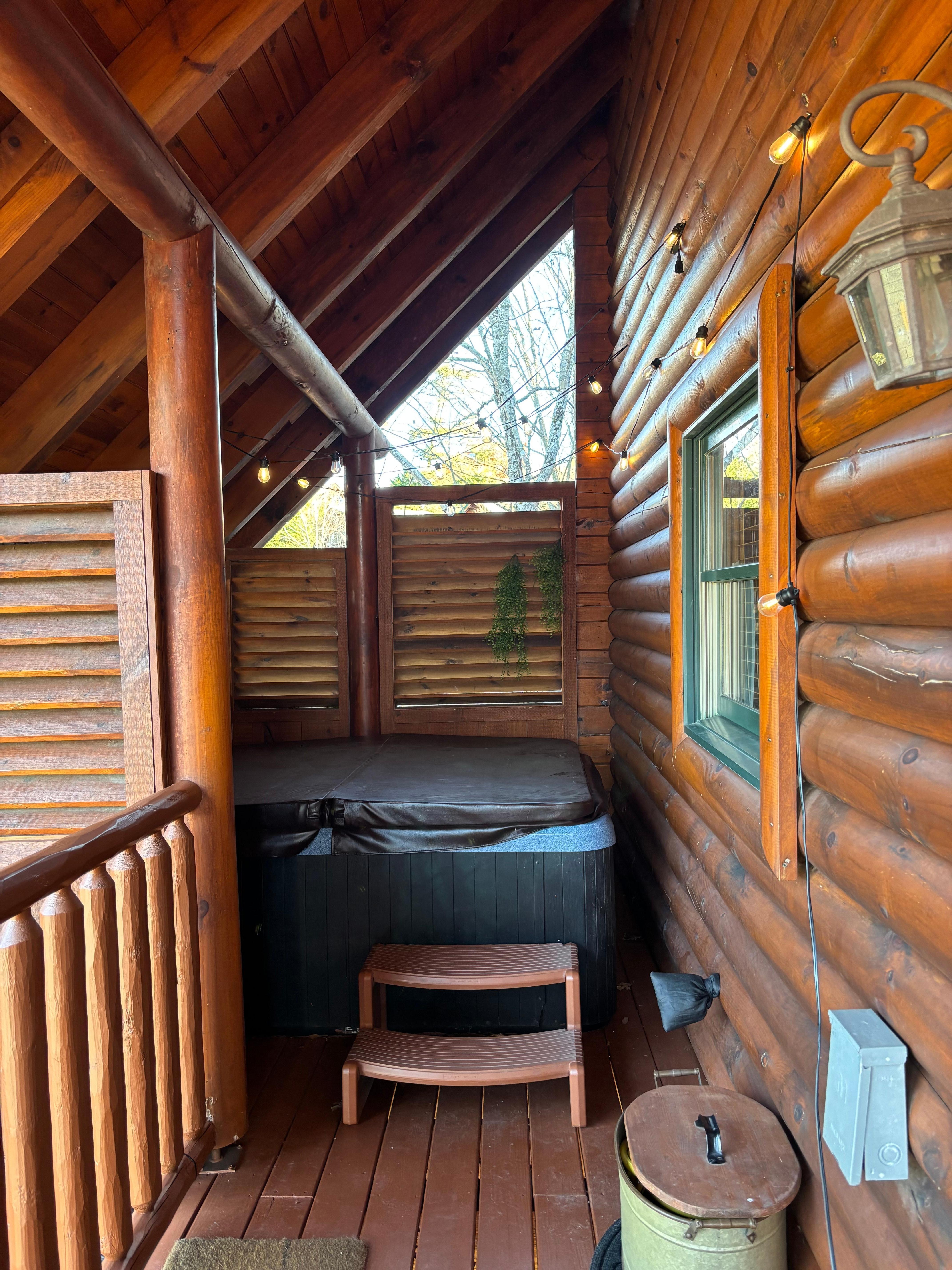 Hot tub on 2nd floor deck.