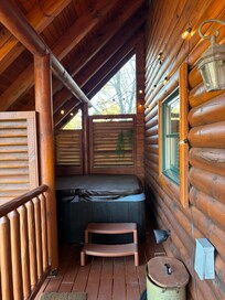 Hot tub on 2nd floor deck.