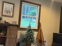 There are wooded areas ( and deer ) in the back of the property.