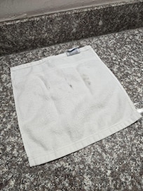 A "clean" towel.