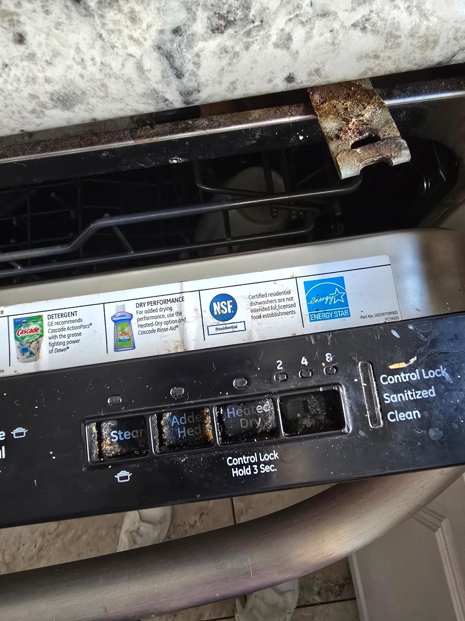 Broken dishwasher buttons and DW detached from cabinet, falling out when opened.