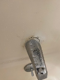 Missing caulk around spout against the wall