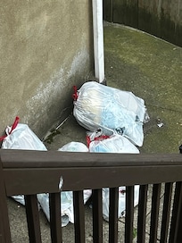 The trash that was left by the previous guests right by the deck. This is where we found a man at 9:45pm on the 3rd night we stayed picking up the trash.