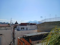 Vesuvius in the distance.