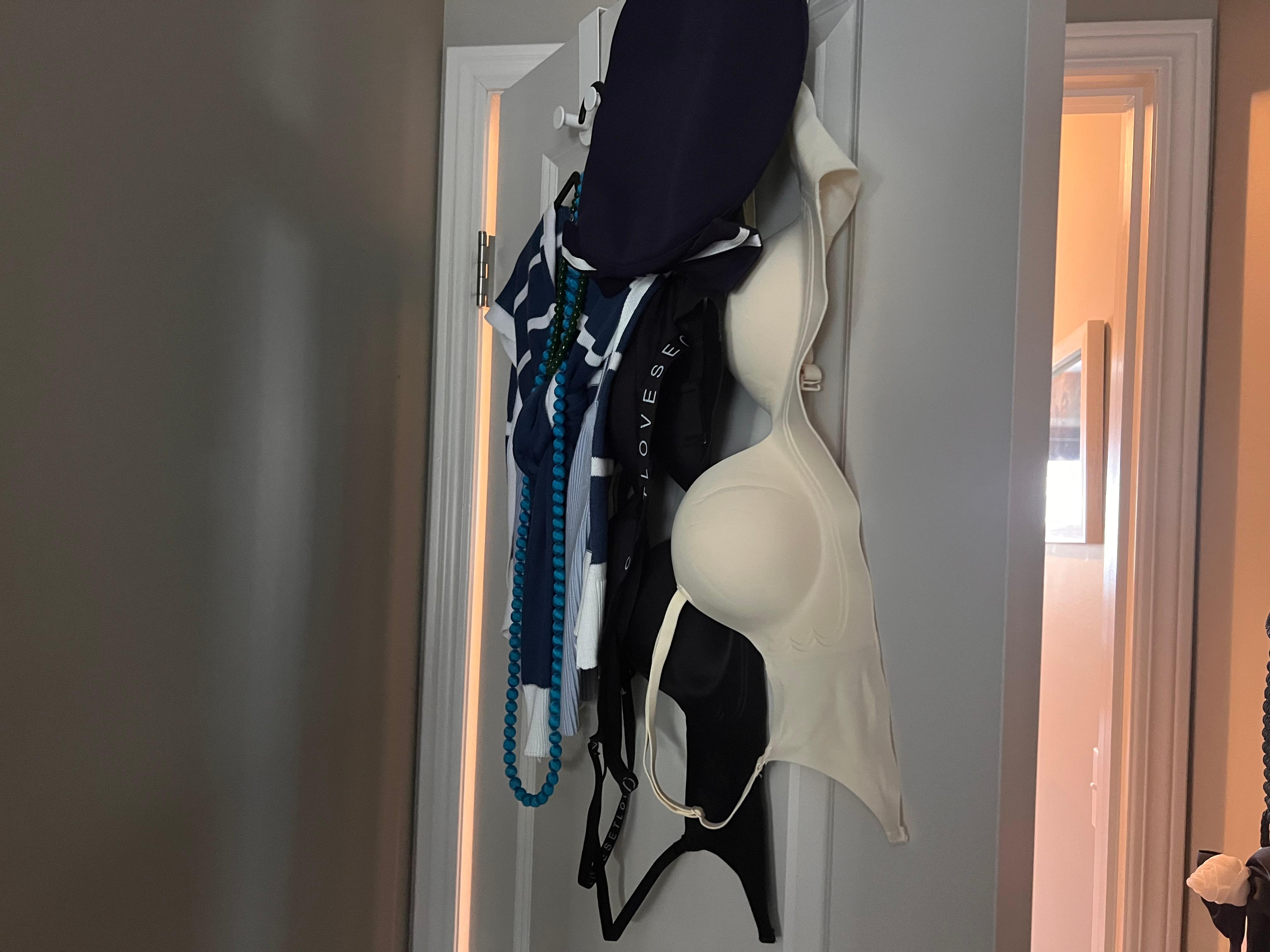 Personal items hanging in bedroom 