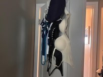 Personal items hanging in bedroom