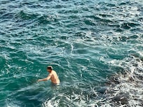 Dipping into the sea at hotel