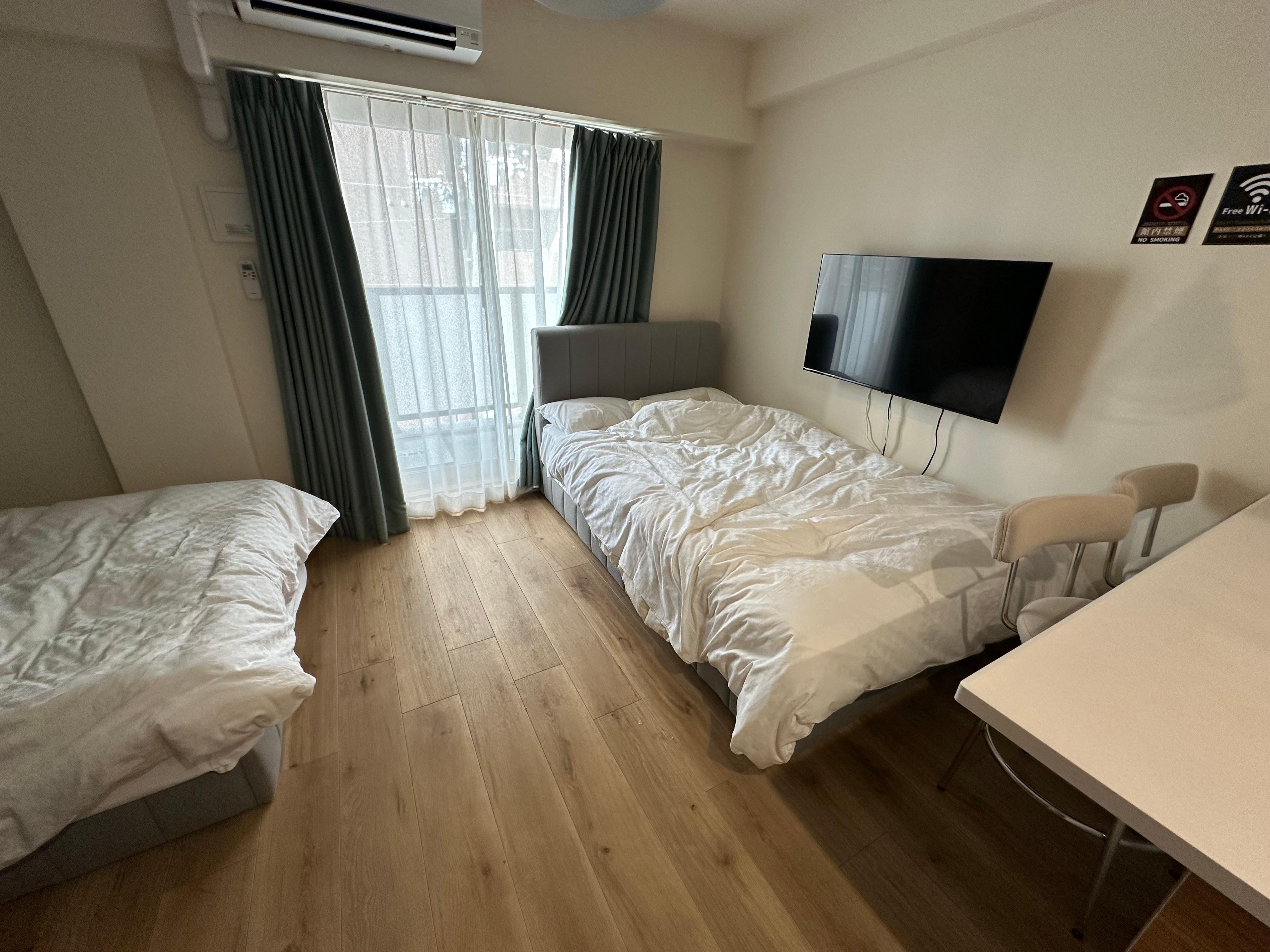 This was the room when we left (beds were made when we arrived)