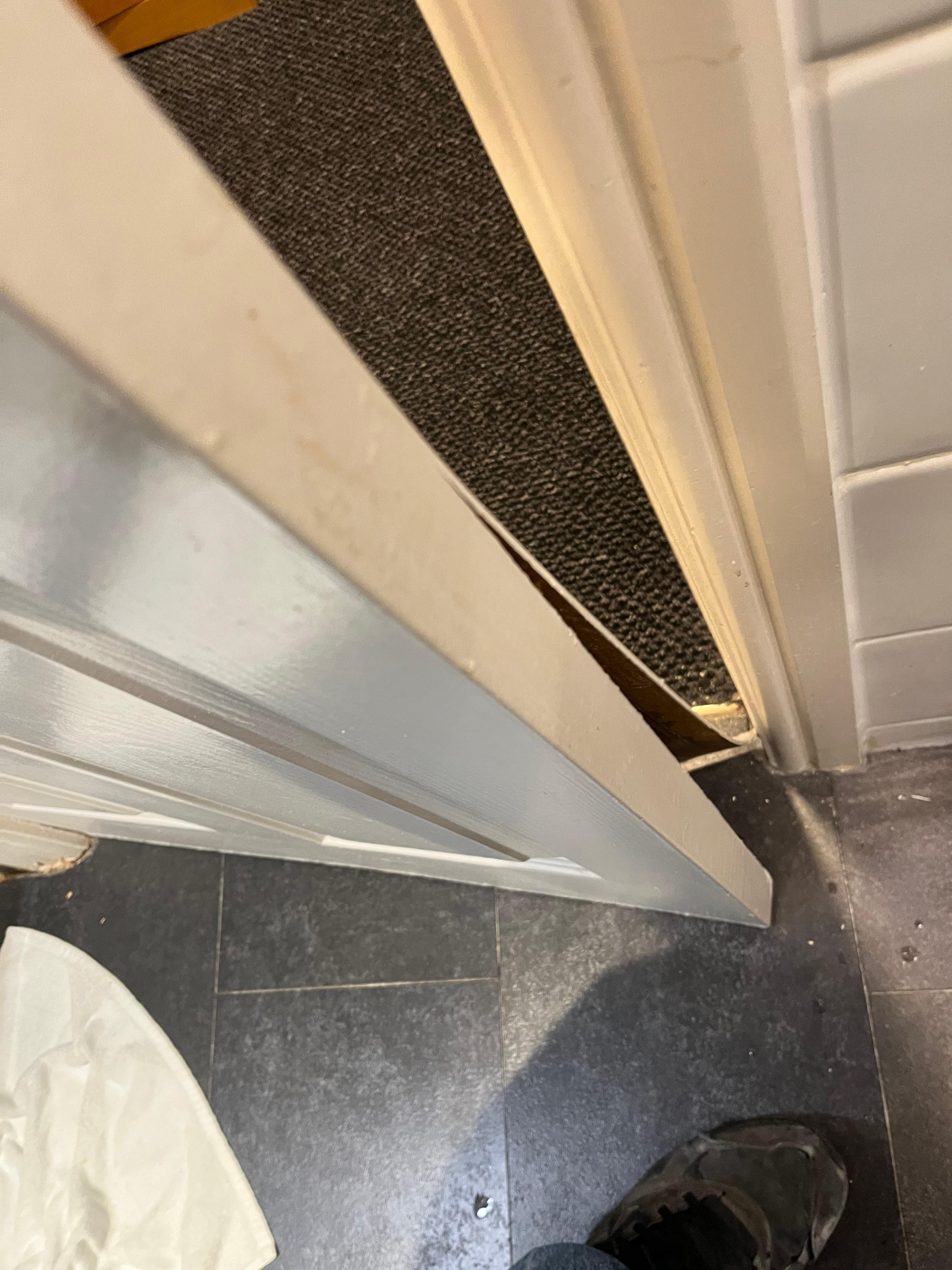 Bathroom catches on frame

Toilet flush didn’t work properly.