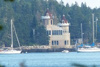 A castle home near Southwest Cove that can be seen from the property (note that this image was taken with a powerful telephoto lens so you'll not be able to see this detail with the naked eye).