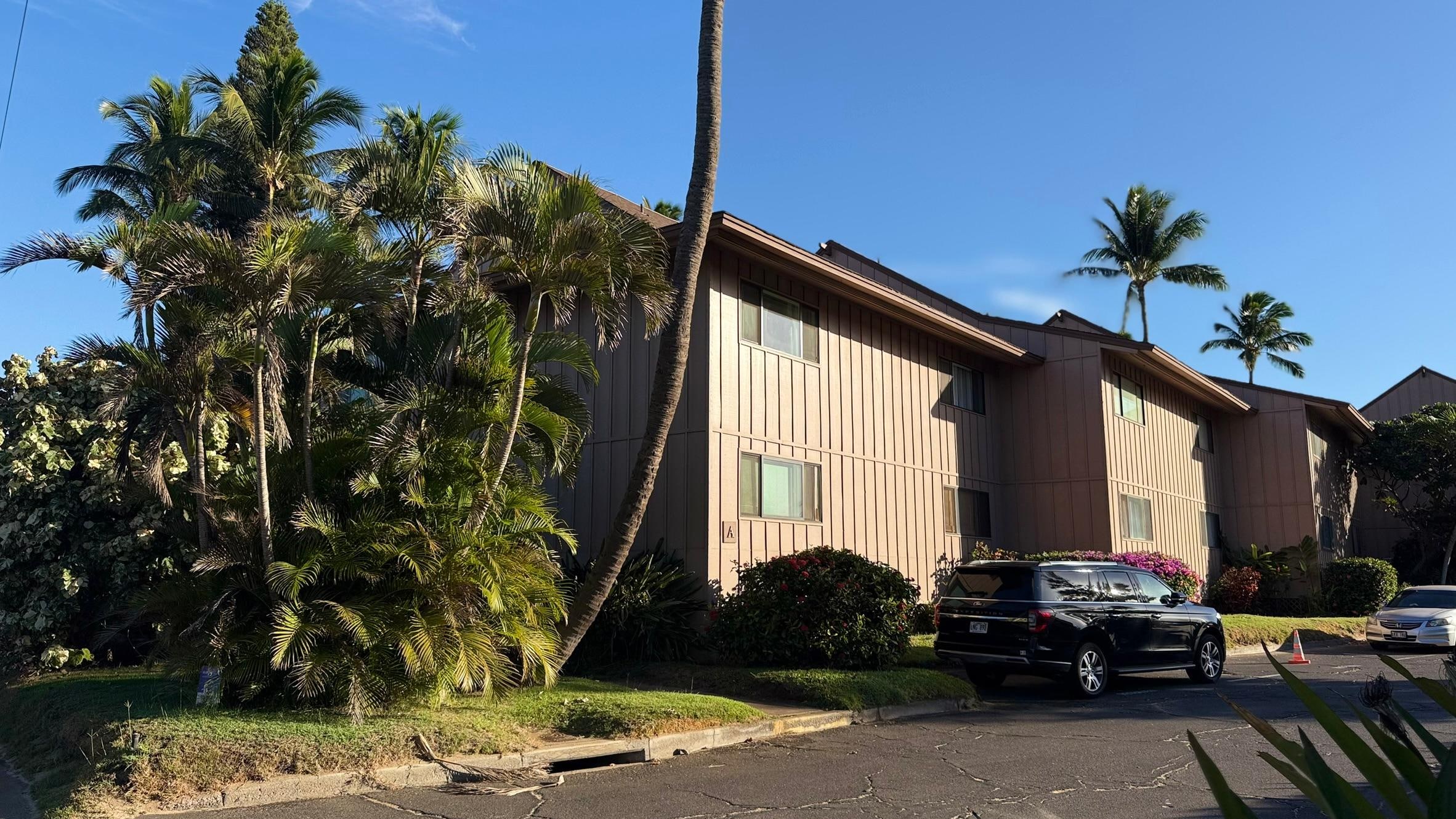 Black Expedition parked in the Reserved spot #1 - just below the 2nd floor  