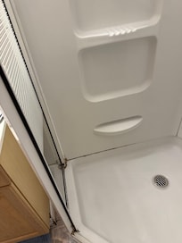 moldy caulk in the bathroom