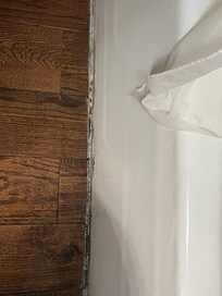 Dirty caulk on the tub