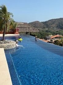 Infiniti pool steps from the condo