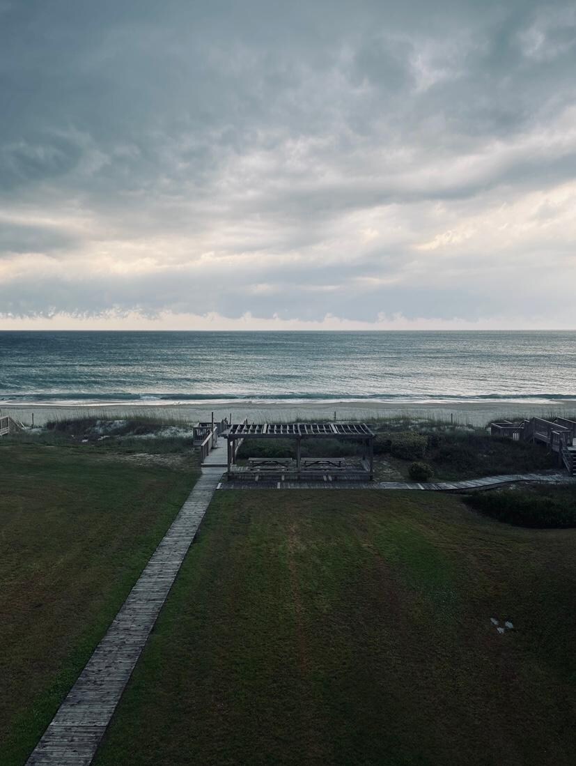 A balcony view of an incoming storm