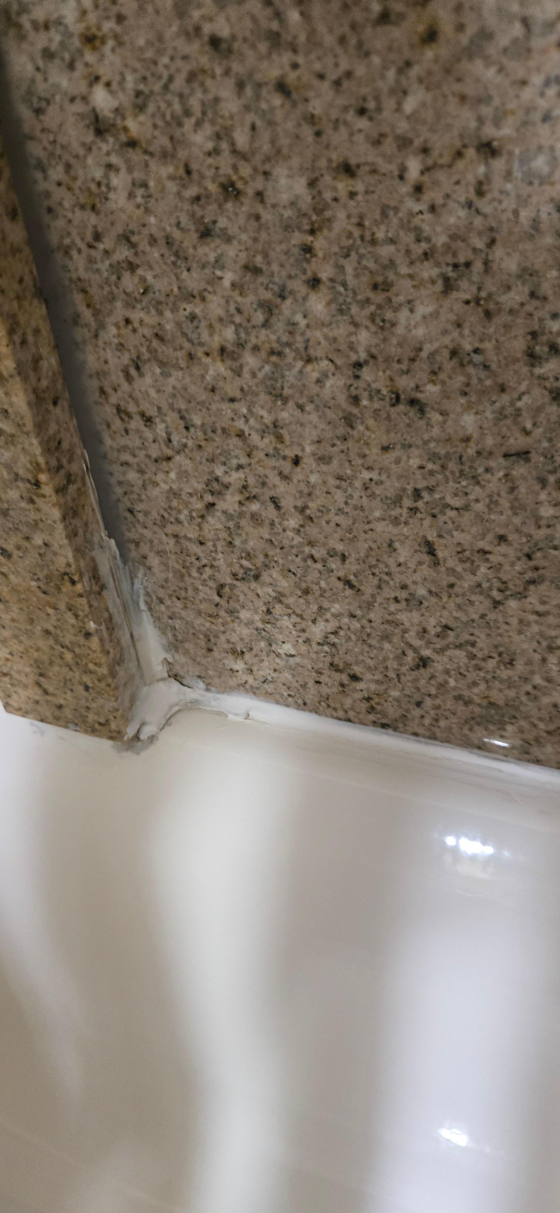 Quality of caulking was sloppy.