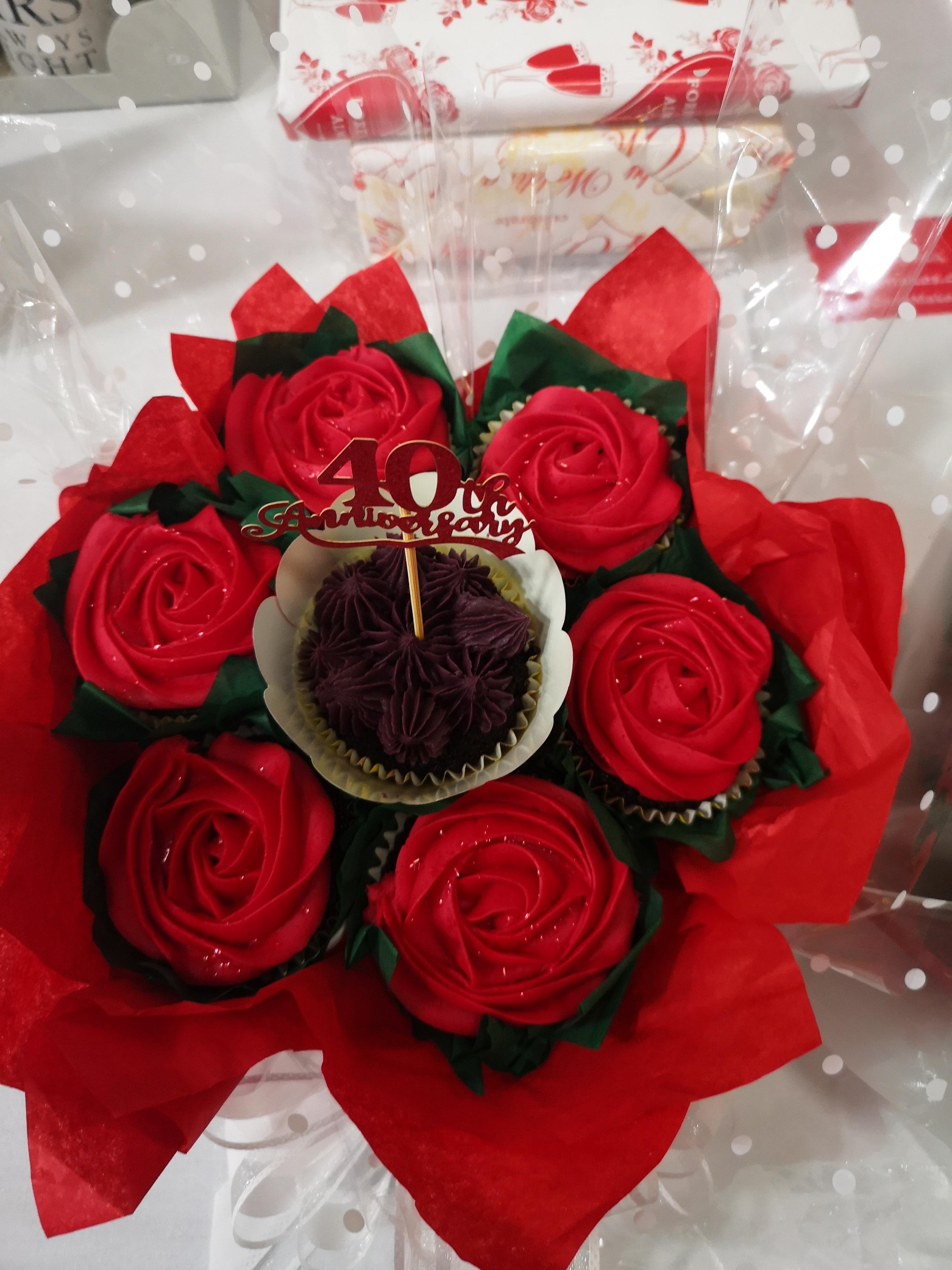 I  made this cup cake bouquet for my sisters ruby wedding party