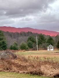 Late in the day, sun painted the ridge.